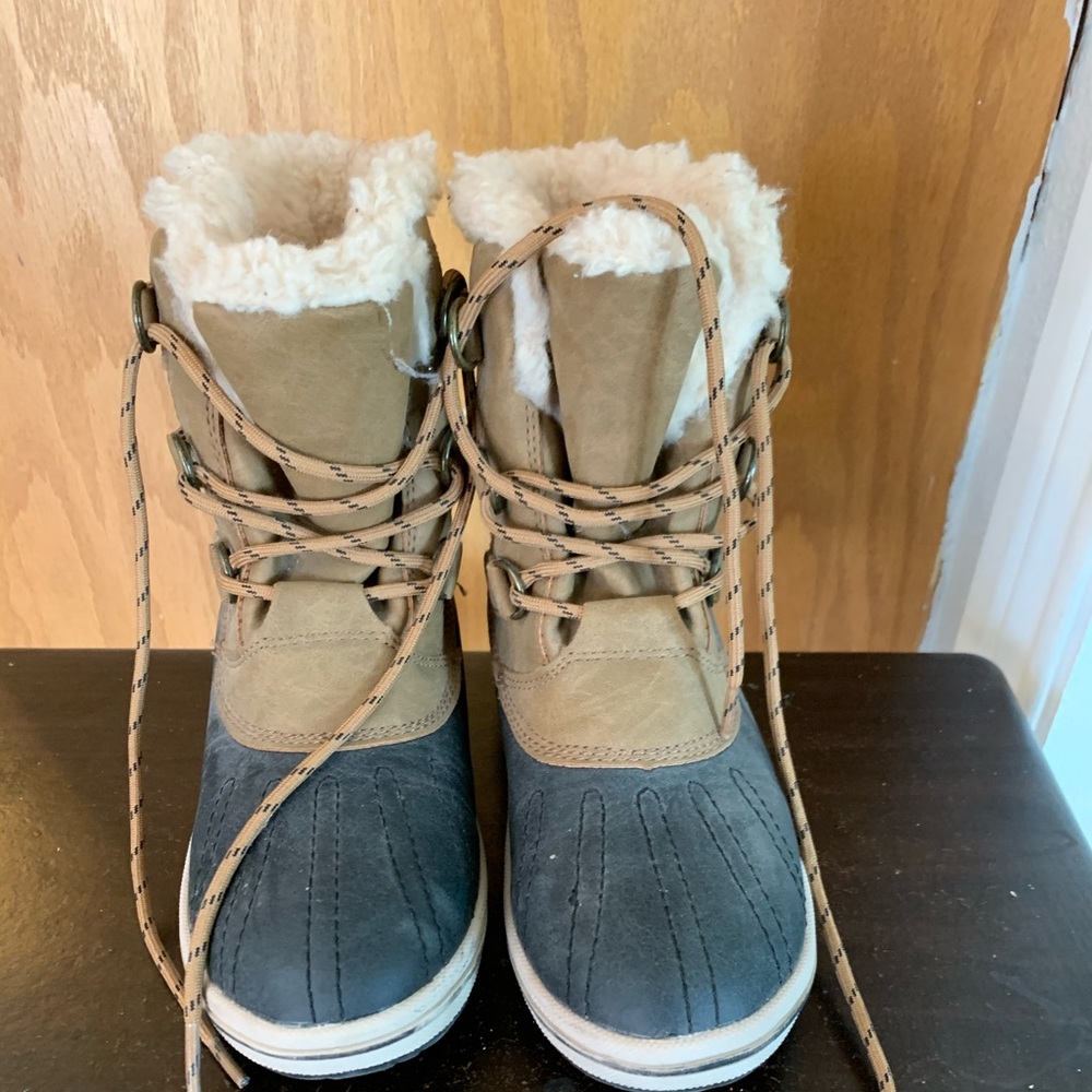 Only worn once and they were too small